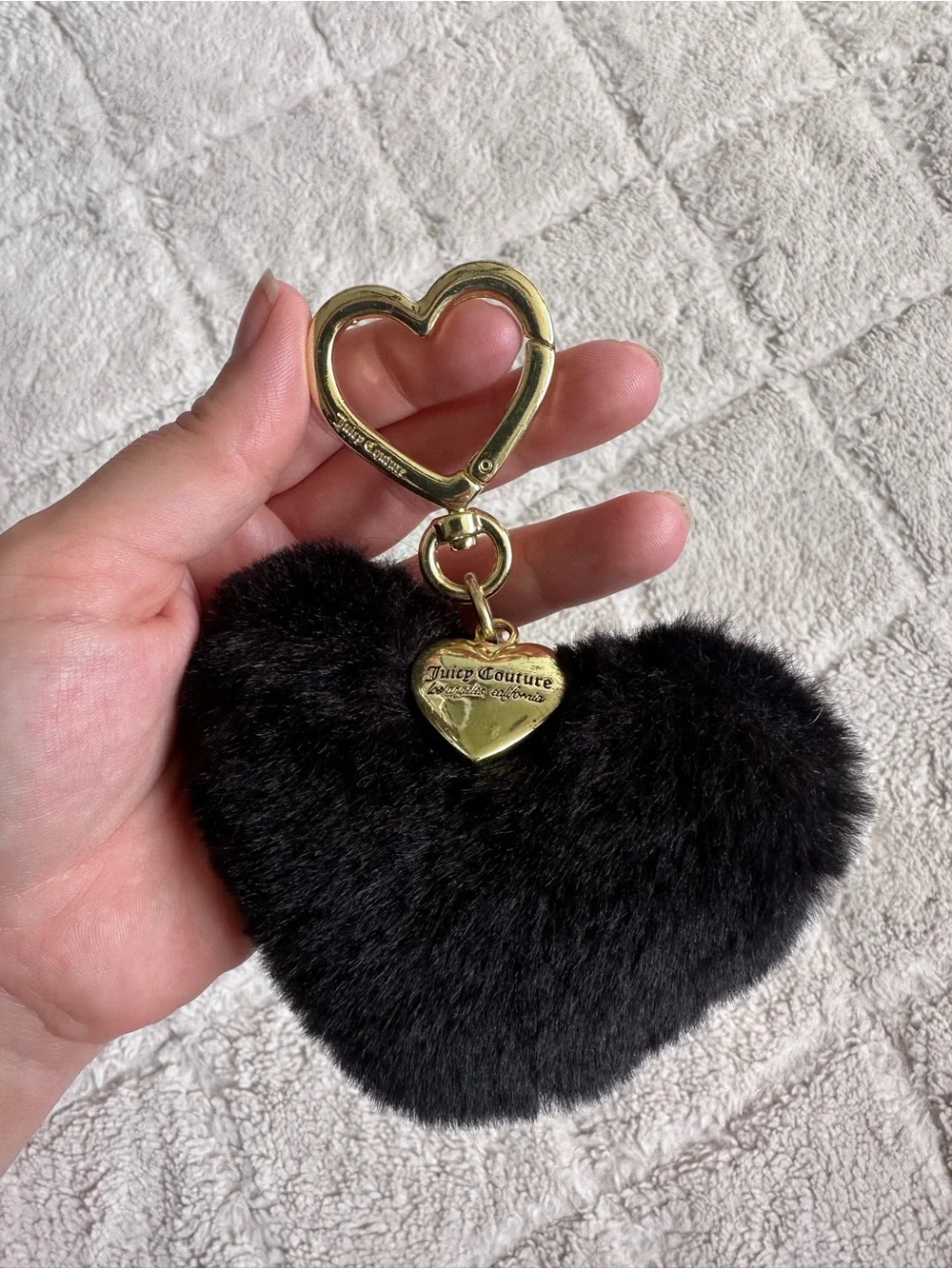 Juicy Couture | Black faux fur heart keychain charm featuring gold-tone Hardwear